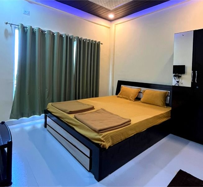 interior image bed room of shoreline ujjwala resort